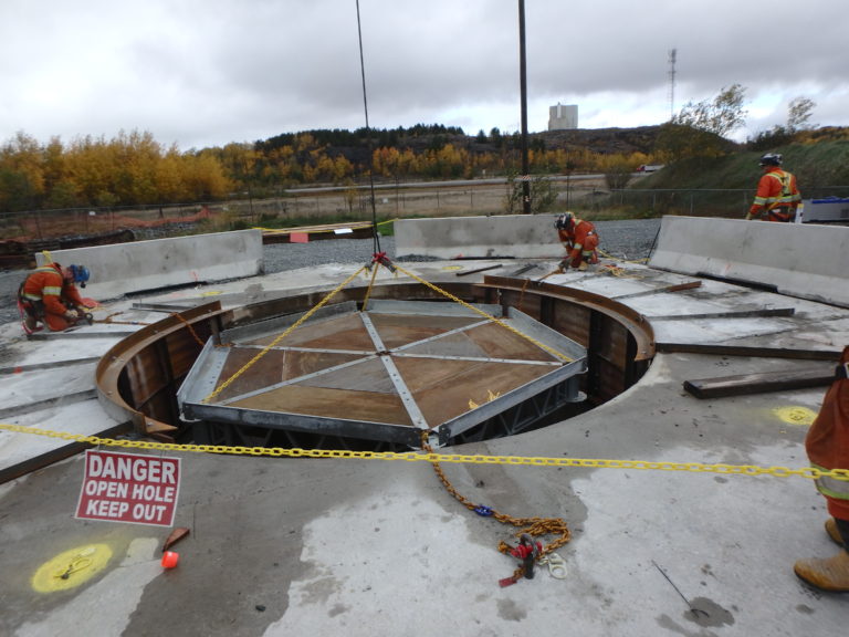 Copper Cliff South Mine 830 FAR Widening: From an existing Surface Level Raise Bore Hole, Legend widened the 14 foot diameter to 18 feet to accommodate ventilation requirements for South mine of the Copper Cliff Complex. At the 350ft mark, Legend also drove a lateral drift 32ft in length for future development opportunities.